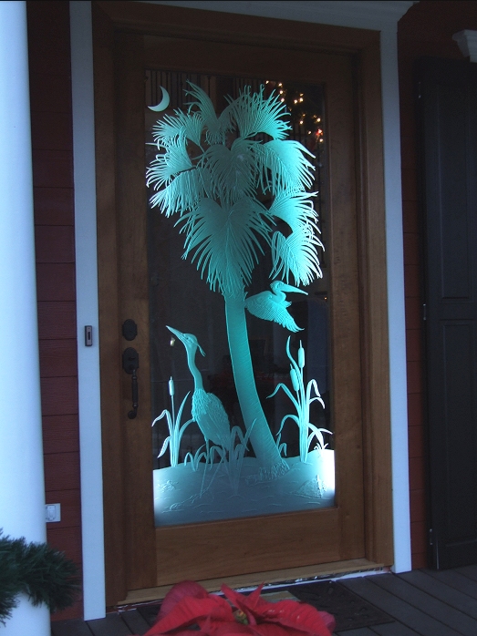 sand carved palmetto tree glass door by lex melfi
